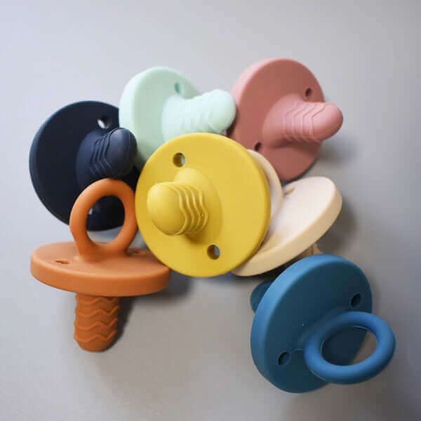 teething pacifier (aqua star) - teal meal