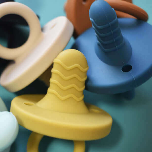teething pacifier (aqua star) - teal meal