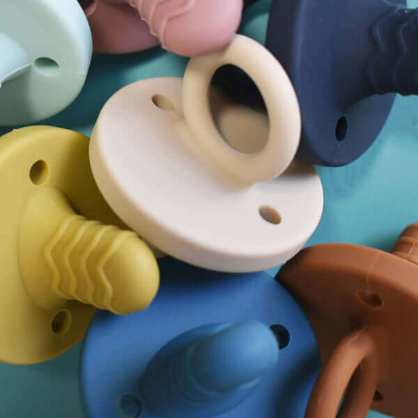 teething pacifier (butternut squash) - teal meal