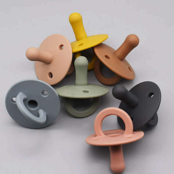 
                  
                    Bibby Pacifier (Moon Sand) - teal meal
                  
                