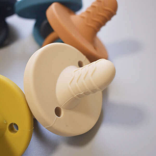 teething pacifier (butternut squash) - teal meal